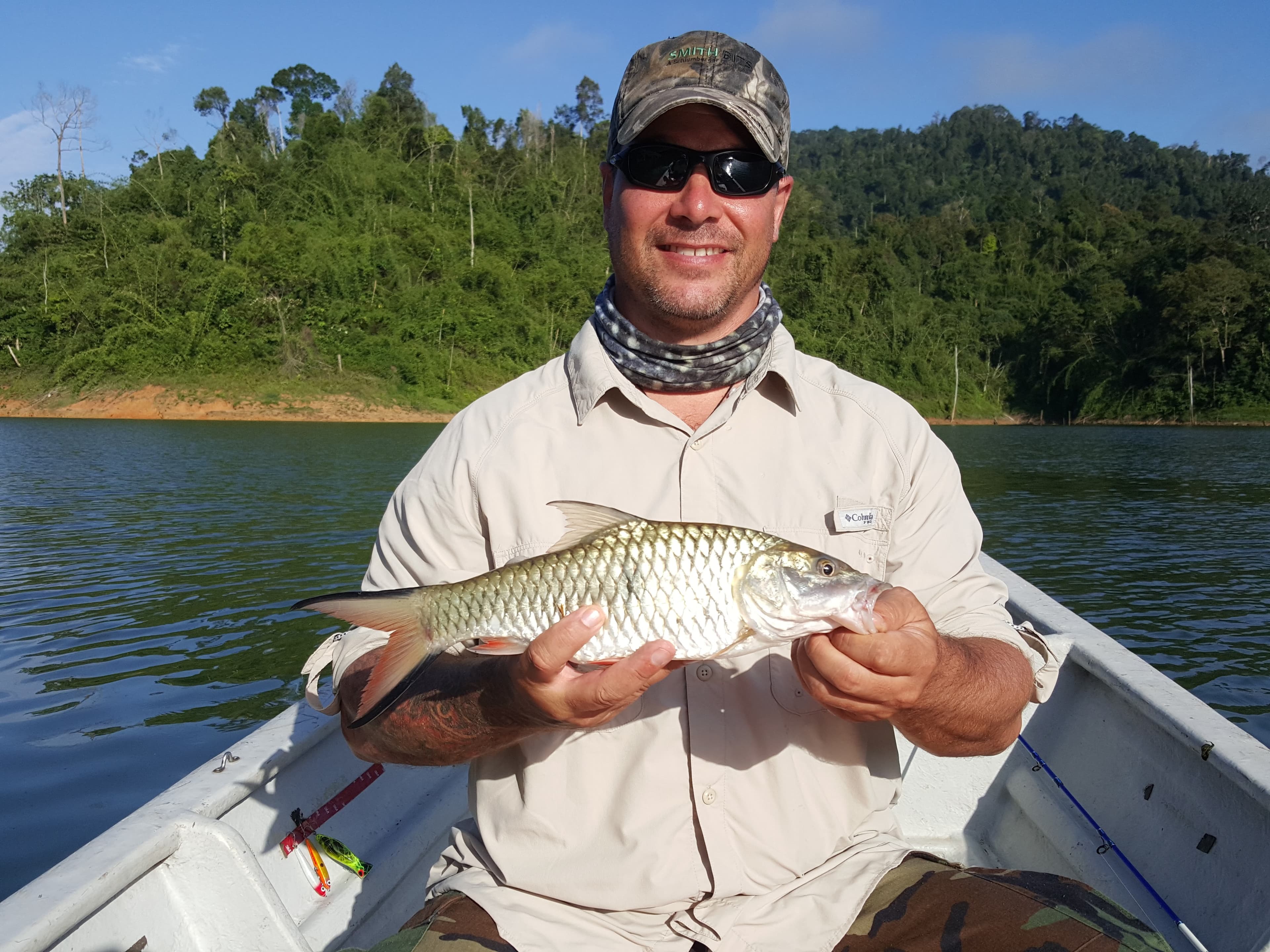 Scott Bremner and his Hampala Barb or Sebarau in Royal Belum, Perak.