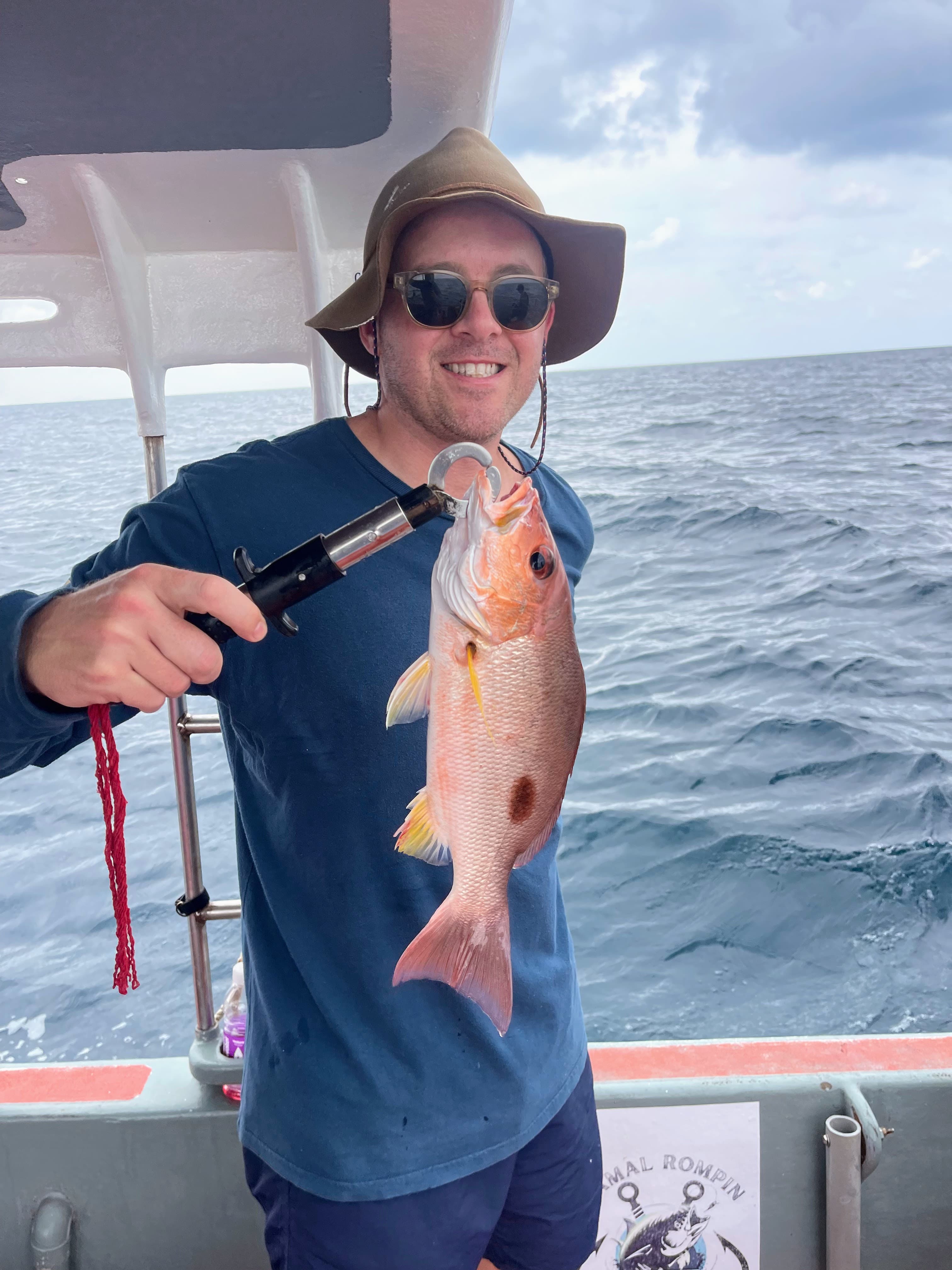 Common red coral snapper over the water of Kuala Rompin.