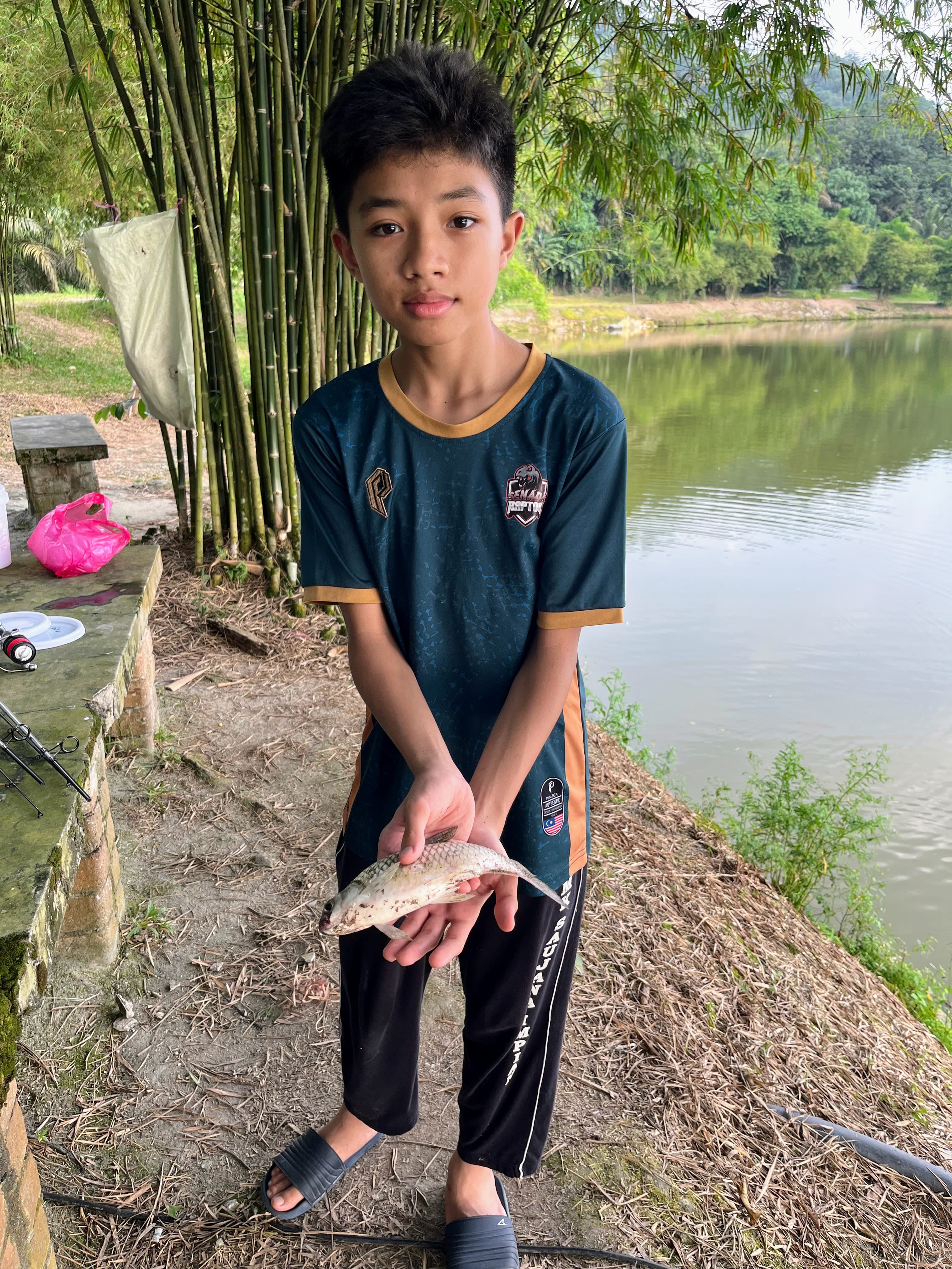 Final fish of the day, Muszaphar Aarif and his Tinfoil Barb.