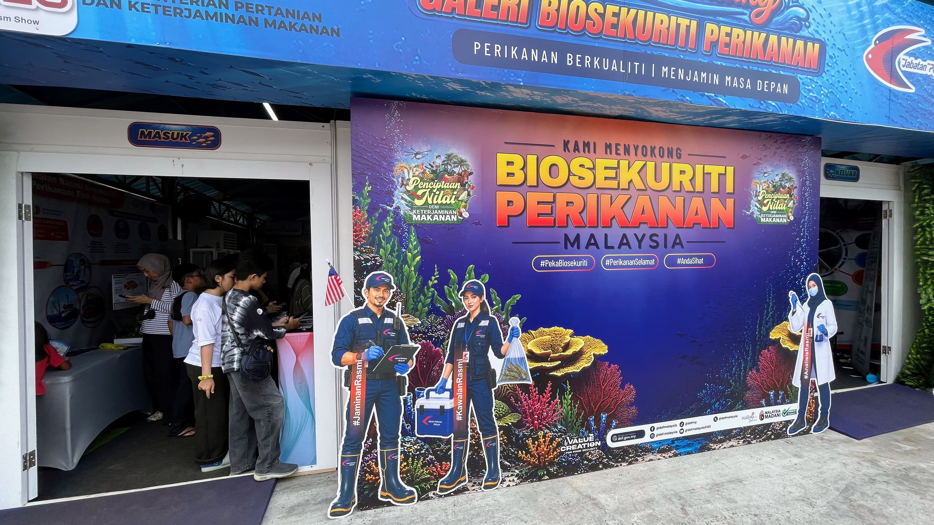 The exterior entrance of the Fisheries Biosecurity (Biosekuriti Perikanan) booth.